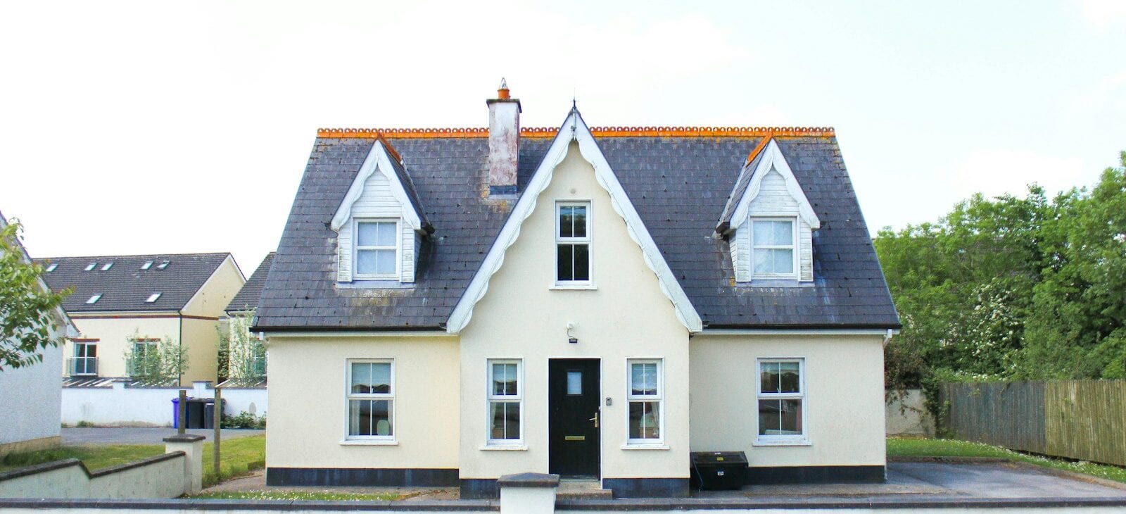 white and brown concrete house